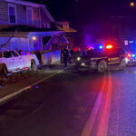Officers from Westover, Morgantown, Mon County Sheriff's Department and West Virginia State Police were involved in a high speed chase Monday night that started in Westover and ended with a wreck on Brockway Avenue. A white pickup truck involved in a chase rests against a porch it struck after it wrecked on Brockway Avenue Monday night. According to scanner traffic, the truck was stolen out of Florida.